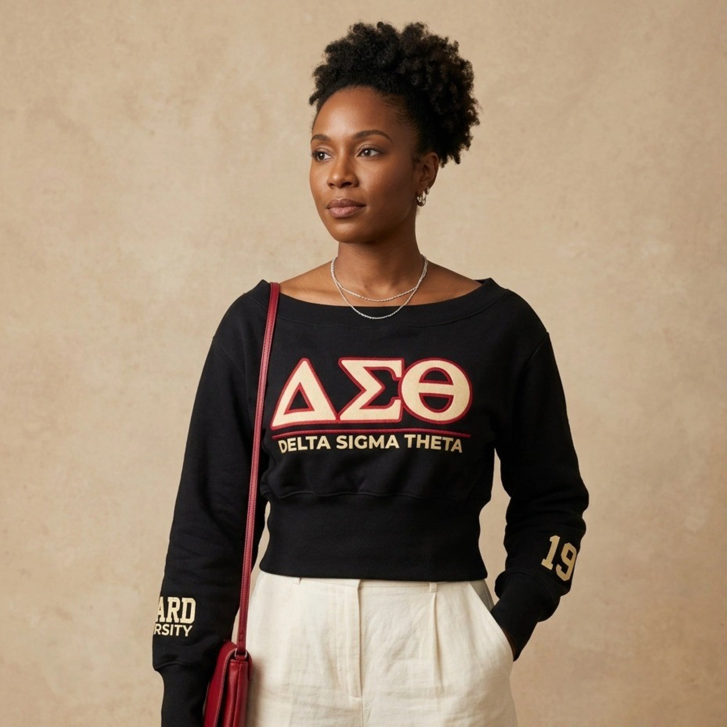 Delta Sigma Theta Embroidered Patch Off-Shoulder Cropped Sweatshirt Black