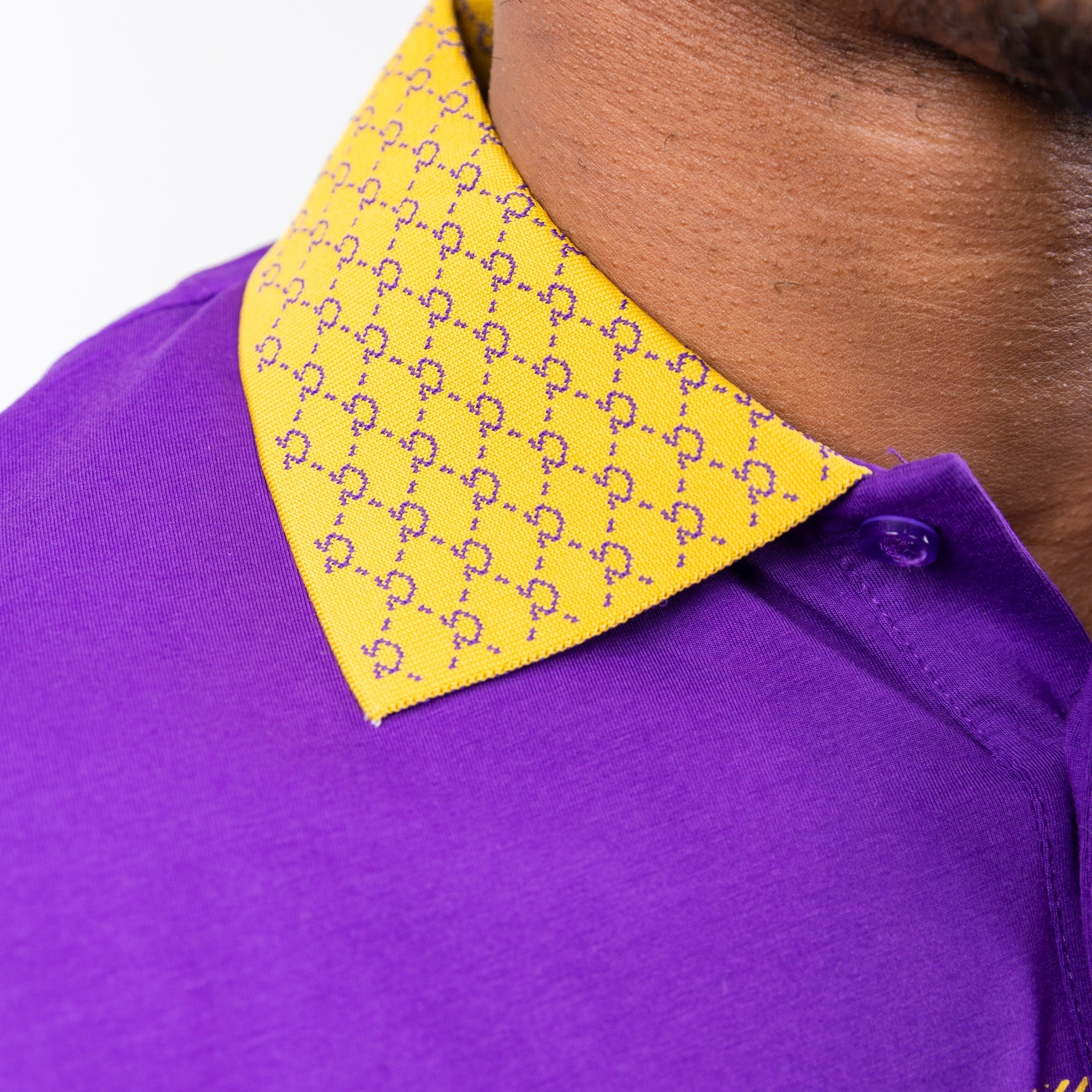 Purple Omega Psi Phi polo with gold collar Winters Industries