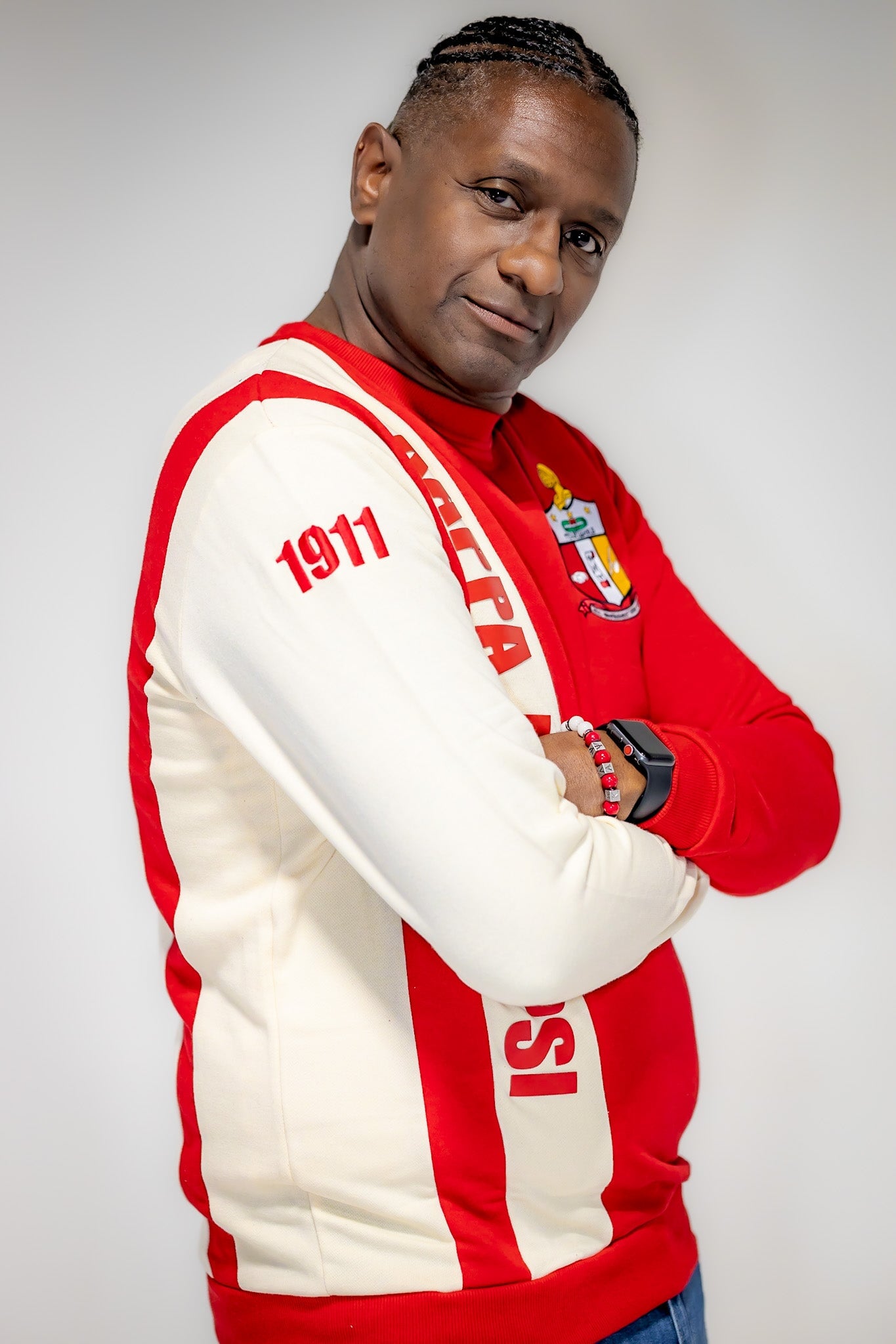 Kappa Alpha Psi Striped Sweater with Shield