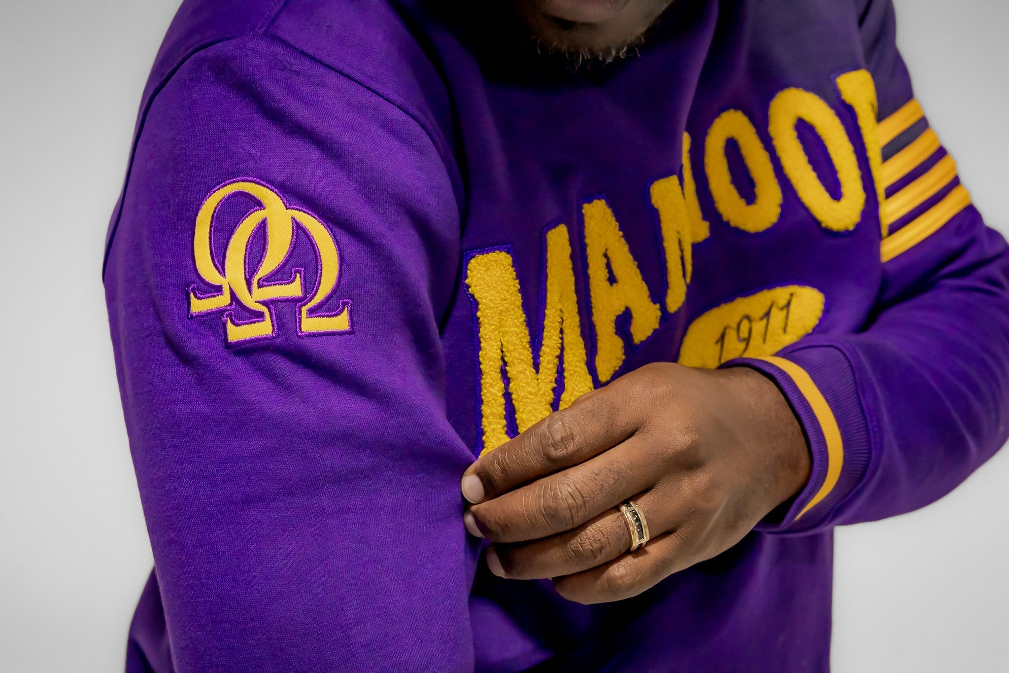 Omega Psi Phi "MANHOOD" Chenille Sweater Purple
