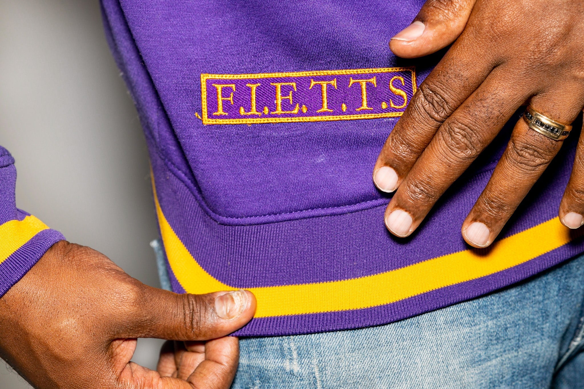 Omega Psi Phi "MANHOOD" Chenille Sweater Purple