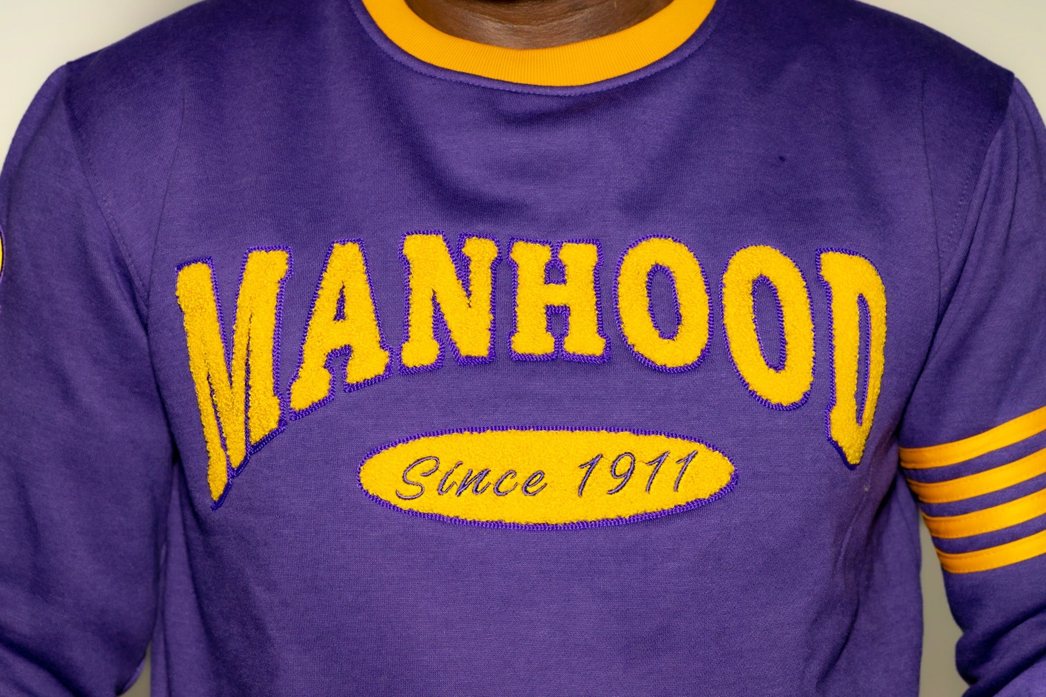 Omega Psi Phi "MANHOOD" Chenille Sweater Purple