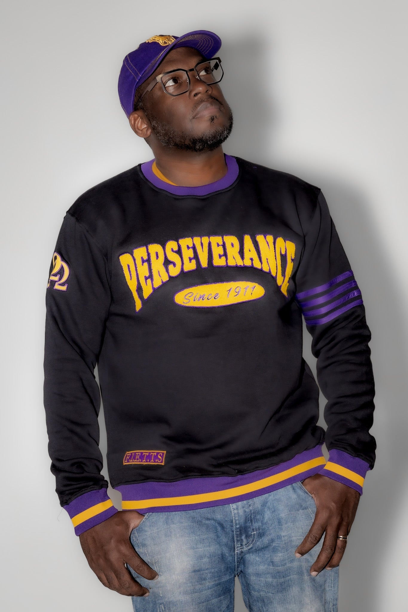 Omega Psi Phi "PERSEVERANCE" Chenille Sweater Black