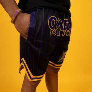 Omega Psi Phi Embroidered Black Shorts with Purple and Gold Stripes