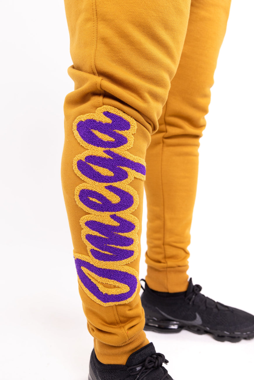 Omega Psi Phi Embroidered / Chenille Tracksuit Gold