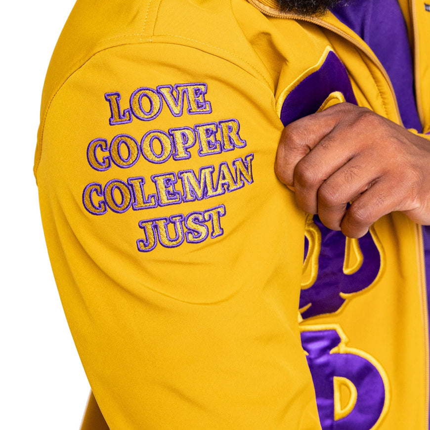 Omega Psi Phi Gold Jacket with Purple and Gold Stripes