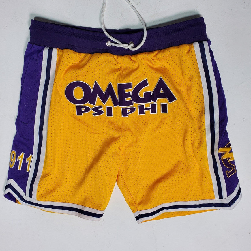 Omega Psi Phi Embroidered Gold Shorts with Purple Stripes